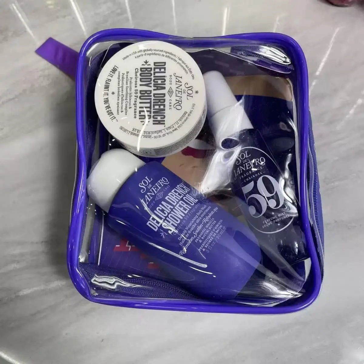 Sol de Janeiro Delícia Drench 3-Piece Body Care Gift Set - Body Butter, Shower Oil & Cheirosa 59 Mist with Purple Pouch